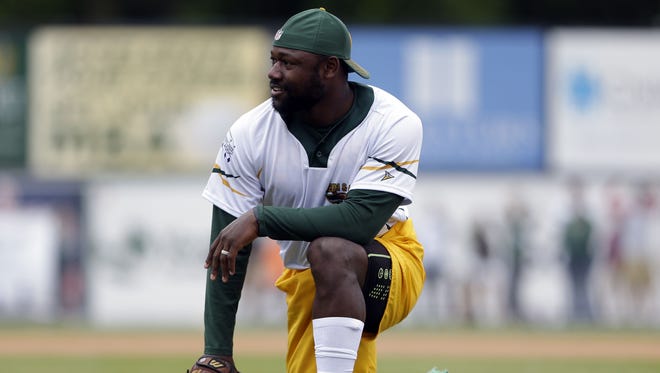 Ty Montgomery waits for the action to start during the Green & Gold Charity Softball Game on June 2, 2018, at Neuroscience Group Field at Fox Cities Stadium in Grand Chute.