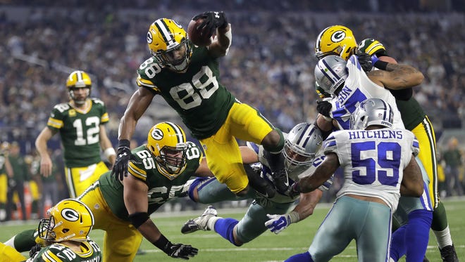 Green Bay Packers running back Ty Montgomery dives for a rushing touchdown in the second quarter during an NFC divisional playoff game on Jan. 15, 2017, at AT&T Stadium in Arlington, Texas.