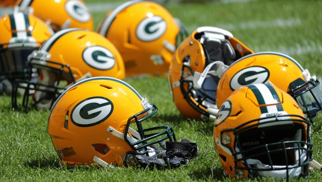 Green Bay Packers helmets are shown during organized team activities on June 4, 2018.