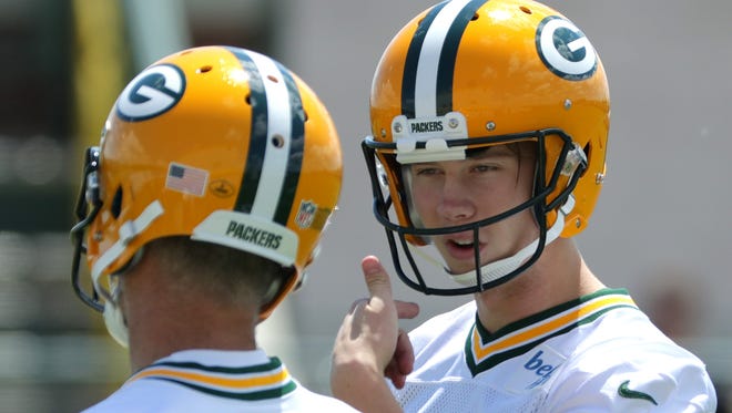 Green Bay Packers punter JK Scott (6) talks with Green Bay Packers kicker Mason Crosby (2) during organized team activities Monday, June 4, 2018 in Green Bay, Wis.