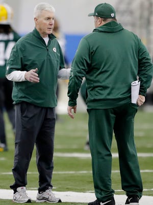 Packers GM Ted Thompson talks to head coach Mike McCarthy during practice at the Don Hutson Center on Wednesday, December 13, 2017, in Ashwaubenon, Wis.