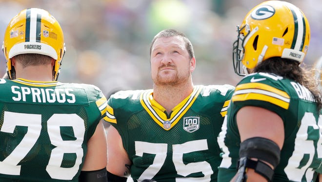Green Bay Packers offensive tackle Bryan Bulaga (75) looks up at the video board at Lambeau Field on Sunday, September 16, 2018 in Green Bay, Wis.
Adam Wesley/USA TODAY NETWORK-Wisconsin