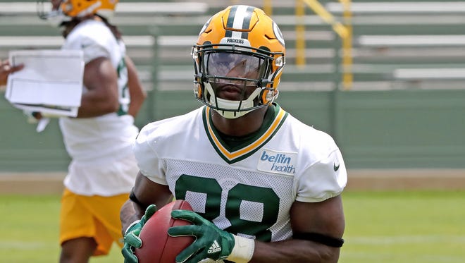 Green Bay Packers running back Ty Montgomery (88) catches a pass during Green Bay Packers minicamp at Ray Nitschke Field Tuesday, June 12, 2018 in Ashwaubenon, Wis.