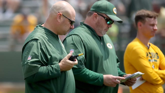 Head coach Mike McCarthy and defensive coordinator  Mike Pettine during Green Bay Packers minicamp at Ray Nitschke Field Tuesday, June 12, 2018 in Ashwaubenon, Wis.
