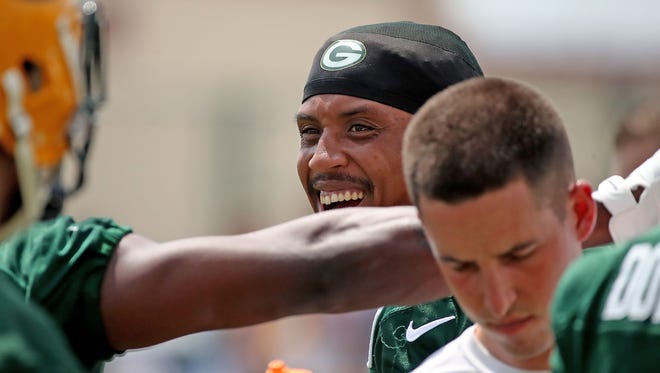 Green Bay Packers cornerback Kevin King (20) laughs during Green Bay Packers minicamp at Ray Nitschke Field Tuesday, June 12, 2018 in Ashwaubenon, Wis.
