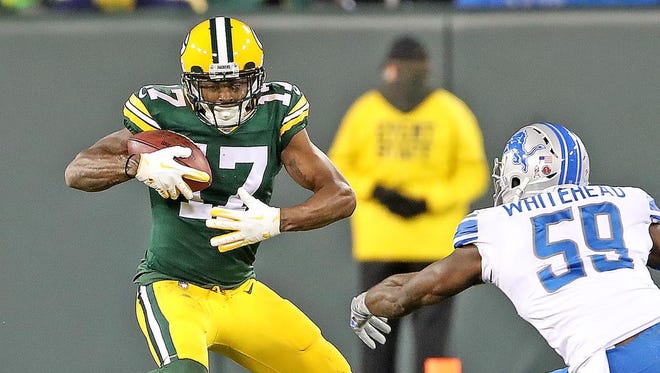 Green Bay Packers wide receiver Davante Adams (17) jukes away from outside linebacker Tahir Whitehead (59) against the Detroit Lions at Lambeau Field  Monday, November 6, 2017 in Green Bay, Wis.