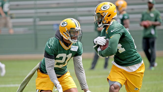 Green Bay Packers free safety Ha Ha Clinton-Dix (21) drills with cornerback Quinten Rollins (24) during Green Bay Packers minicamp at Ray Nitschke Field Tuesday, June 12, 2018 in Ashwaubenon, Wis.