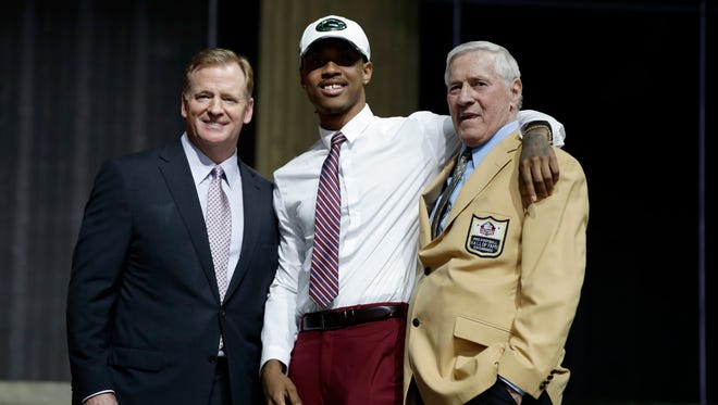 Kevin King, center, poses with former Green Bay Packers legend Jim Taylor, right, and NFL commissioner Roger Goodell after King was selected by the Packers during the second round of the 2017 NFL draft.