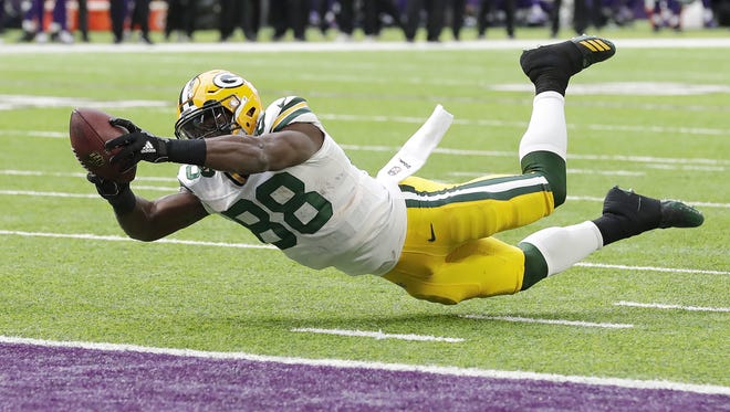 Green Bay Packers running back Ty Montgomery (88) dives for the end zone in the second quarter against the Minnesota Vikings on Oct. 15, 2017, in Minneapolis.