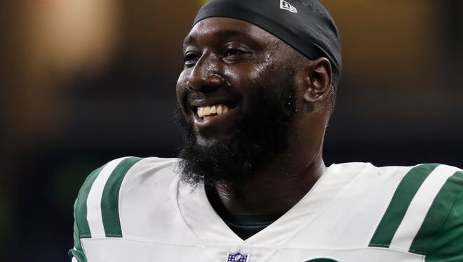 Former New York Jets defensive end Muhammad Wilkerson smiles during a preseason game in Detroit on Aug. 19, 2017.