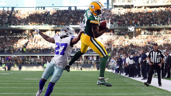 Packers receiver Davante Adams secures the game-winning touchdown with 11 seconds remaining over Cowboys cornerback Jourdan Lewis on Oct. 8.