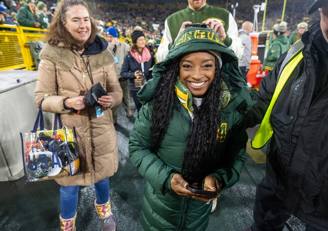 World champion and Olympic Gold Medallist gymnast Simone Biles is shown before the Green Bay Packers - Kansas City Chiefs game Sunday, December 3, 2023 at Lambeau Field in Green Bay.