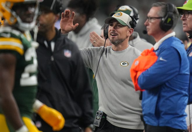 Green Bay Packers head coach Matt LaFleur is shown after his team scored a touchdown during the third quarter of the wild card playoff game Sunday, January 14, 2024 at AT&T Stadium in Arlington, Texas.
