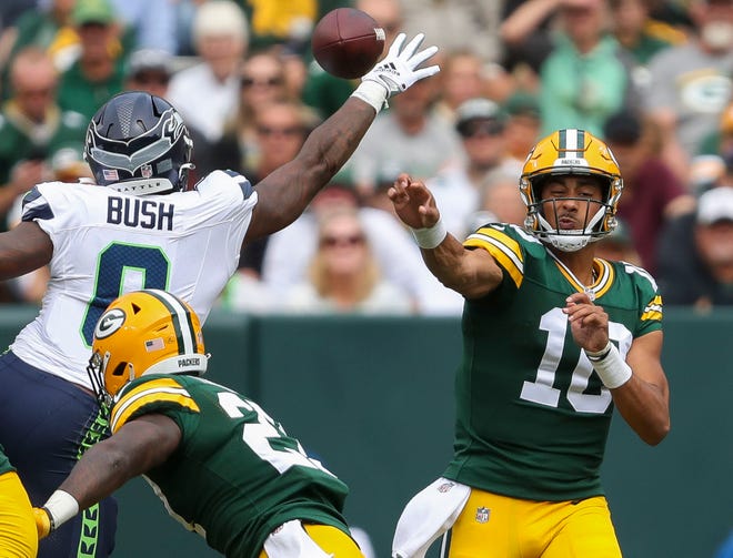 Green Bay Packers quarterback Jordan Love (10) passes the ball against the Seattle Seahawks during their preseason football game on Aug. 26, 2023, at Lambeau Field in Green Bay, Wis.