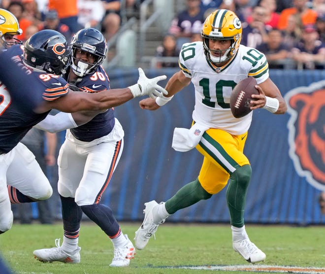 Green Bay Packers quarterback Jordan Love (10) looks to pass during the second half of their game against the Chicago Bears at Soldier Field on Sept. 10, 2023.