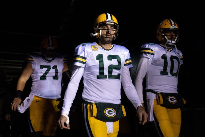 Green Bay Packers quarterback Aaron Rodgers (12) and quarterback Jordan Love (10) lead their team out of the tunnel before action Philadelphia Eagles at Lincoln Financial Field on Nov. 27, 2022.