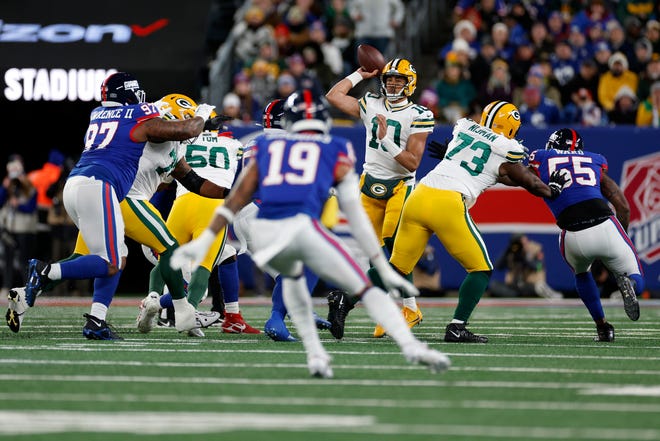 Jordan Love (10) of the Green Bay Packers throws a pass against the New York Giants during the first quarter in the game at MetLife Stadium on Dec. 11, 2023 in East Rutherford, New Jersey.