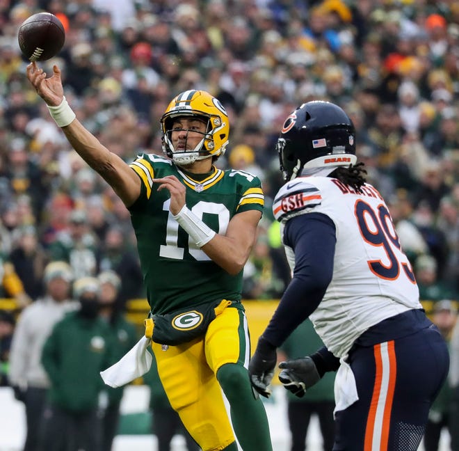Green Bay Packers quarterback Jordan Love (10) throws a pass against the Chicago Bears on Jan. 7, 2024, at Lambeau Field in Green Bay, Wis. The Packers won the game, 17-9, to clinch a NFC playoff berth.