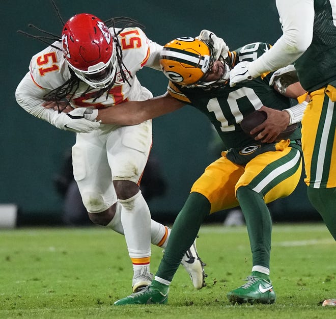 Kansas City Chiefs defensive end Mike Danna (51) sacks Green Bay Packers quarterback Jordan Love (10) during the fourth quarter of their game Sunday, December 3, 2023 at Lambeau Field in Green Bay, Wisconsin. The Green Bay Packers beat the Kansas City Chiefs 27-19.