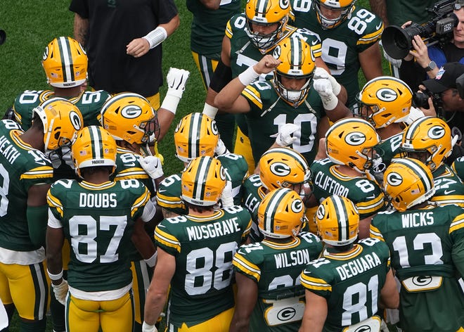 Green Bay Packers quarterback Jordan Love (10) talks to his team during the first quarter of their game Sunday, September 24, 2023 at Lambeau Field in Green Bay, Wis.