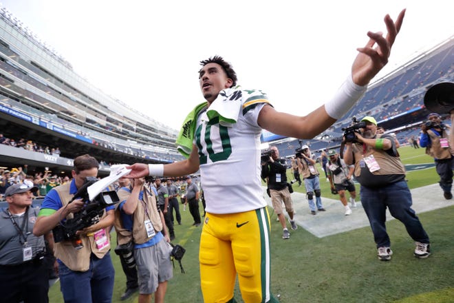 Green Bay Packers quarterback Jordan Love (10) celebrates a victory against the Chicago Bears as he leaves the field during their football game Sunday, September 10, 2023, at Soldier Field in Chicago, Ill. Green Bay won 38-20.