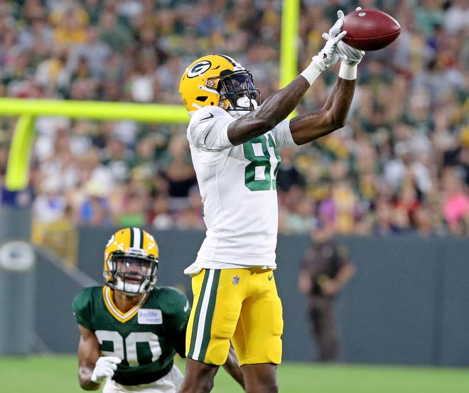 Green Bay Packers wide receiver Geronimo Allison (81) makes leaping catch during Green Bay Packers Family Night  Saturday, August 4, 2018 at Lambeau Field in Green Bay, Wis.,