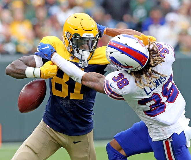 Green Bay Packers wide receiver Geronimo Allison (81) has the ball knocked loose by defensive back Ryan Lewis (38) against the Buffalo Bills Sunday September 30, 2018 at Lambeau Field in Green Bay, Wis.