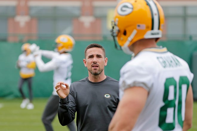 Green Bay Packers head coach Matt LaFleur talks to tight end Jimmy Graham (80) during practice at Clarke Hinkle Field on Wednesday, May 29, 2019 in Ashwaubenon, Wis.