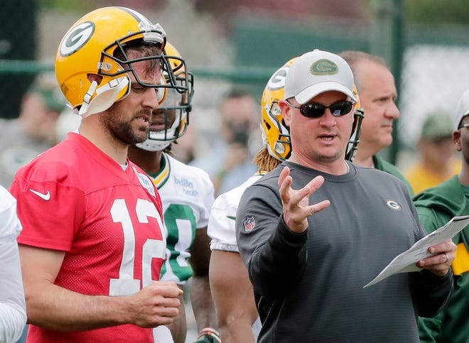 Green Bay Packers offensive coordinator Nathaniel Hackett and quarterback Aaron Rodgers (12) during practice at Clarke Hinkle Field on Wednesday, May 29, 2019 in Ashwaubenon, Wis.