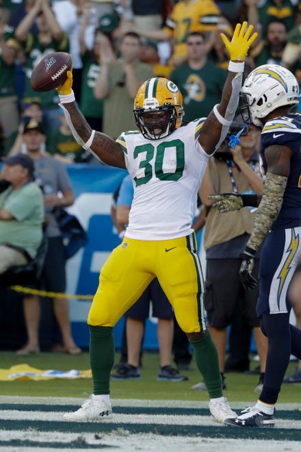 Green Bay Packers running back Jamaal Williams celebrates after scoring against the Los Angeles Chargers during the second half of an NFL football game Sunday, Nov. 3, 2019, in Carson, Calif. (AP Photo/Marcio Jose Sanchez)