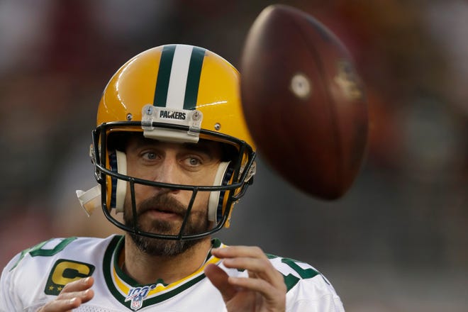 Green Bay Packers quarterback Aaron Rodgers warms up before an NFL football game against the San Francisco 49ers in Santa Clara, Calif., Sunday, Nov. 24, 2019. (AP Photo/Ben Margot)