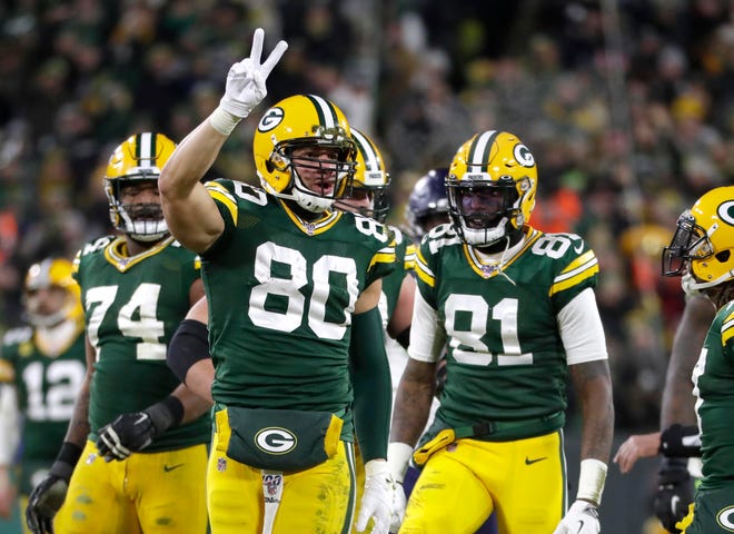 Green Bay Packers tight end Jimmy Graham (80) makes a crucial first down in the 4th quarter during  the Green Bay Packers 28-23 win over the Seattle Seahawks to advance to the Divisional playoff game Sunday, January 12, 2020 at Lambeau Field in Green Bay, Wisconsin.