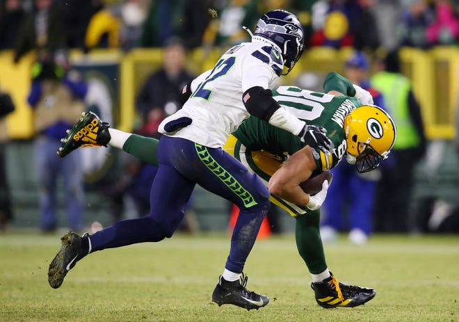 Jimmy Graham #80 of the Green Bay Packers runs after making a reception during the fourth quarter against the Seattle Seahawks in the NFC Divisional Playoff game at Lambeau Field on January 12, 2020 in Green Bay, Wisconsin.