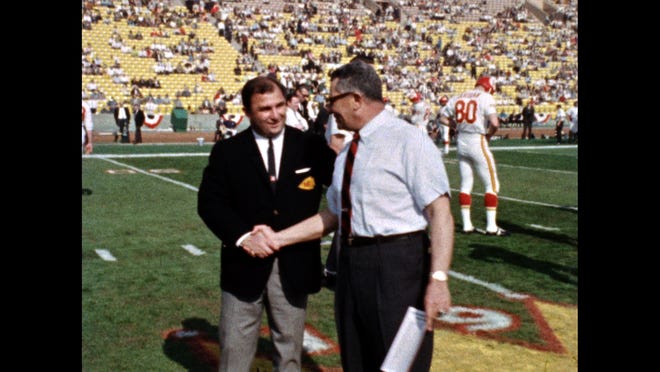 Kansas City Chiefs coach Hank Stram shakes hand with Green Bay Packers coach Vince Lombardi during Super Bowl I on Jan. 15, 1967, at Los Angeles California's Memorial Coliseum. The Green Bay Packers beat the Kansas City Chiefs, 35-21.