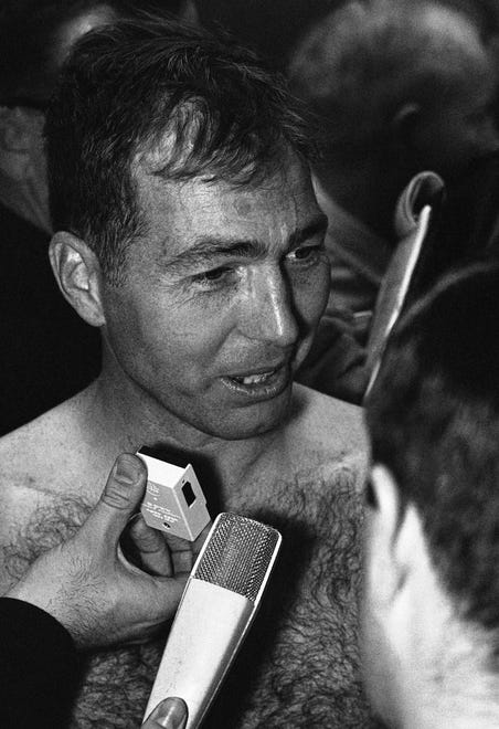 In this Jan. 15, 1967, file photo, Green Bay Packers quarterback Bart Starr, who guided his team to a win over the Kansas City Chiefs in football's first Super Bowl game, is interviewed in the dressing room in Los Angeles.