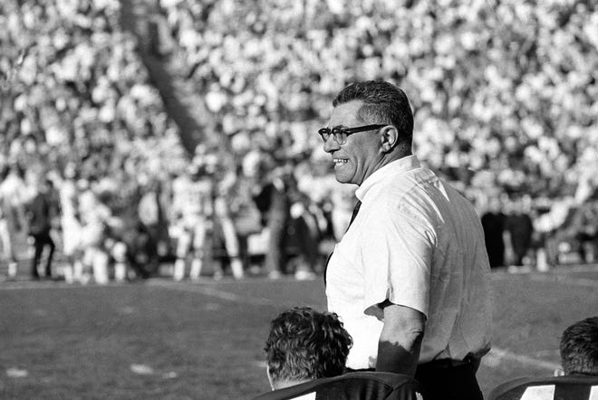 Green Bay Packers coach Vince Lombardi cheers on his champion team as they swamp the Kansas City Chiefs, 35-10 during Super Bowl I, in Los Angeles, Calif., Jan. 15, 1967.