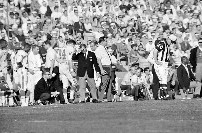 Kansas City Chiefs Coach Hank Stram (dark jacket) suffers through his team's 35-10 loss to the Green Bay Packers during Super Bowl I at the Los Angeles Memorial Coliseum in Los Angeles, Calif., Jan. 15, 1967.