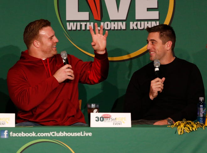 Green Bay Packers quarterback Aaron Rodgers (right) hangs out with then-fullback and teammate John Kuhn on the Dec. 1, 2014, episode of Clubhouse Live. The show was held in the Red Lion Hotel Paper Valley's Grand Ballroom in downtown Appleton.