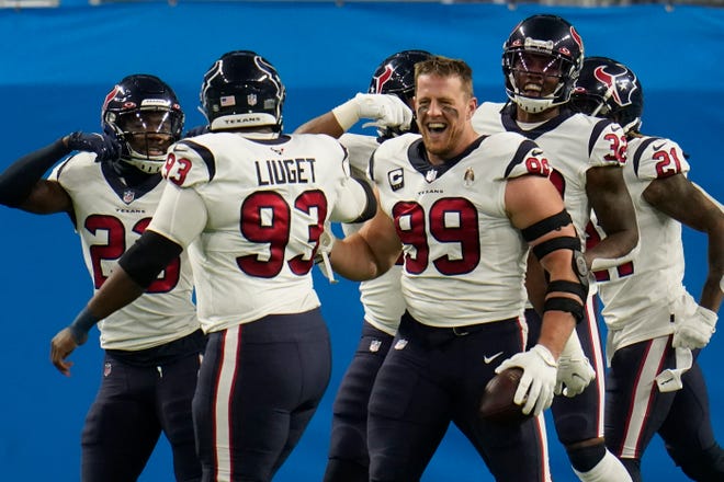 Defensive end J.J. Watt celebrates his interception and 19-yard return for a touchdown in the Houston Texans' win over the Detroit Lions in November.