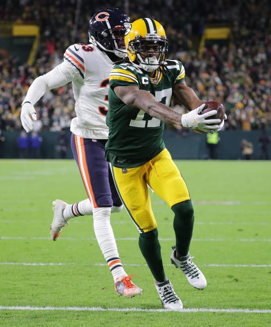 Green Bay Packers wide receiver Davante Adams (17) scores a touchdown on a 33-yard reception during the second quarter of their game Sunday, December 12, 2021 at Lambeau Field in Green Bay, Wis.
