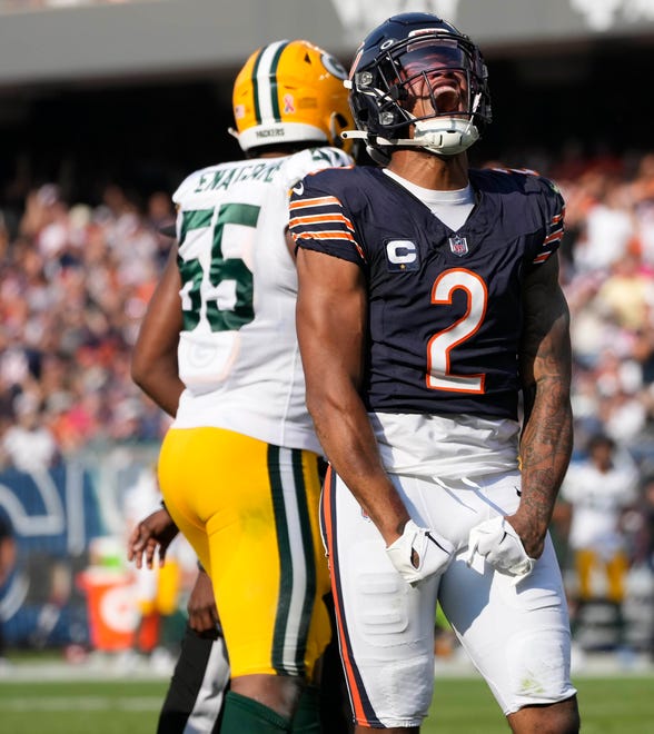 Chicago Bears wide receiver DJ Moore (2) celebrates a first down during second quarter of their game against the Chicago Bears on Sunday, Sept. 10, 2023 at Soldier Field in Chicago.