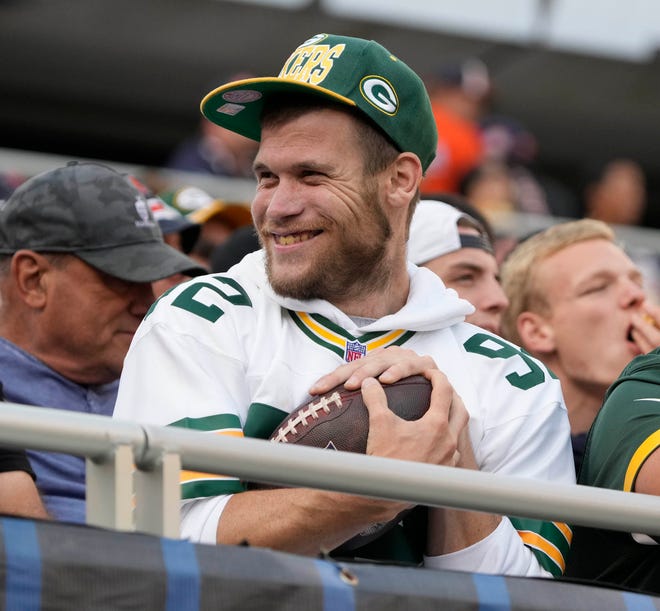 John Akstulewicz, of Green Bay hold his football given to him by Green Bay Packers cornerback Rasul Douglas after Douglas fumble recovery during second half of their game on Sunday, Sept. 10, 2023 at Soldier Field in Chicago.